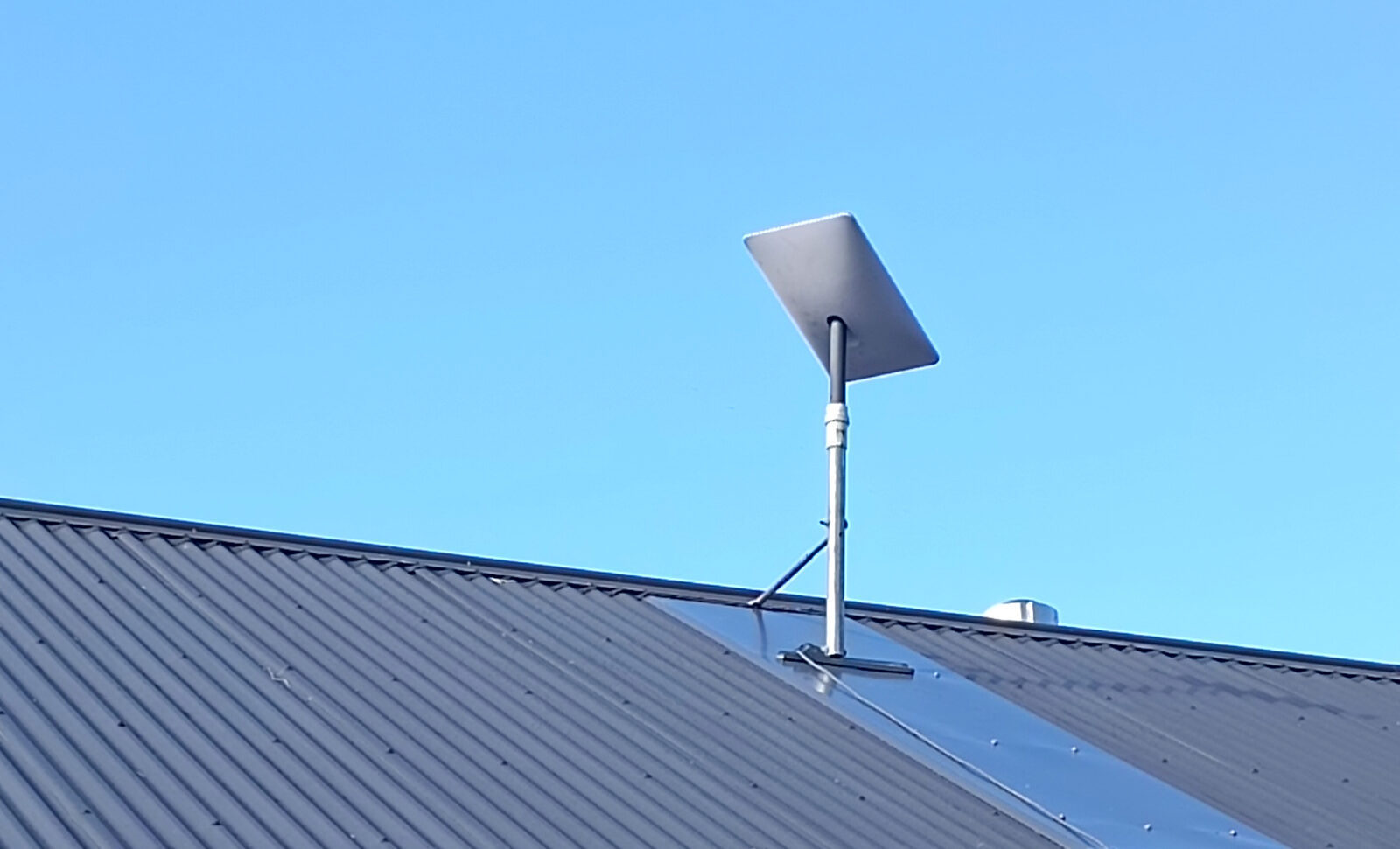 Starlink satellite dish installation on Perth home roof